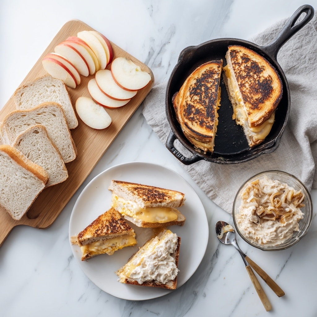 A stack of three grilled cheese sandwiches is shown, each sandwich cut diagonally to reveal two layers of melted cheese and caramelized golden-brown onions in between slices of toasted bread with a perfectly browned, crispy crust. Fresh green thyme sprigs are placed on top of the sandwiches and scattered around the wooden board they rest on, which contrasts with the white marbled surface in the background. The bread texture looks soft inside with a crunchy grilled outer layer, and the cheese appears gooey and melted, oozing slightly from the sides. Photo taken with an iphone --ar 4:5 --v 7